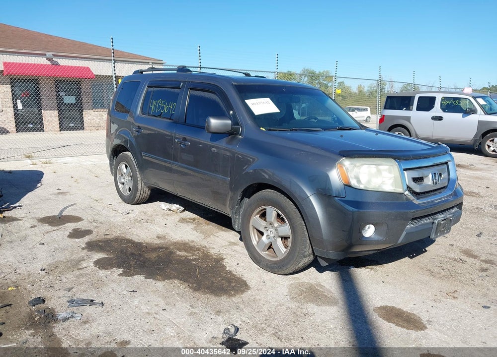 2011 HONDA PILOT EX-L VIN: 5FNYF4H76BB044051