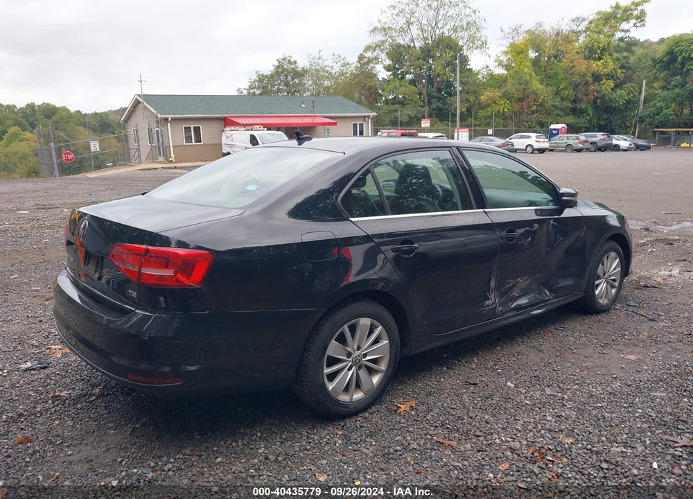 2015 VOLKSWAGEN JETTA 1.8T SE VIN: 3VWD17AJ9FM232467