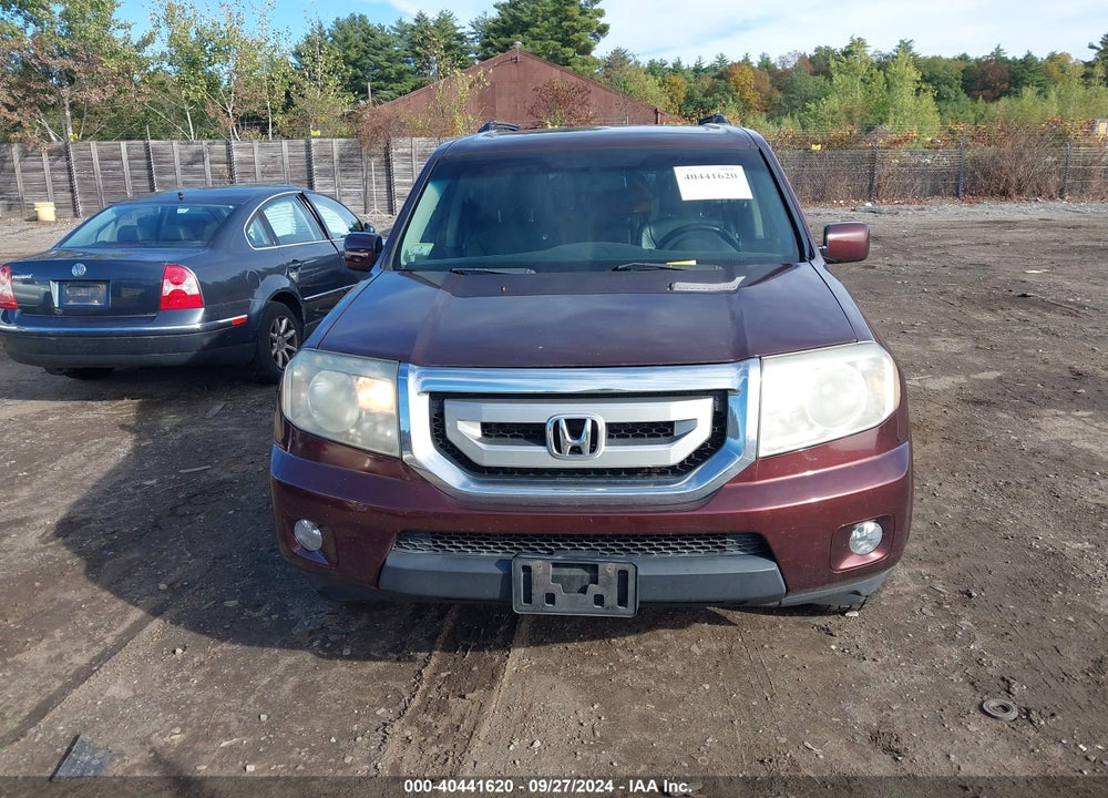 2009 HONDA PILOT EX-L VIN: 5FNYF486X9B024791