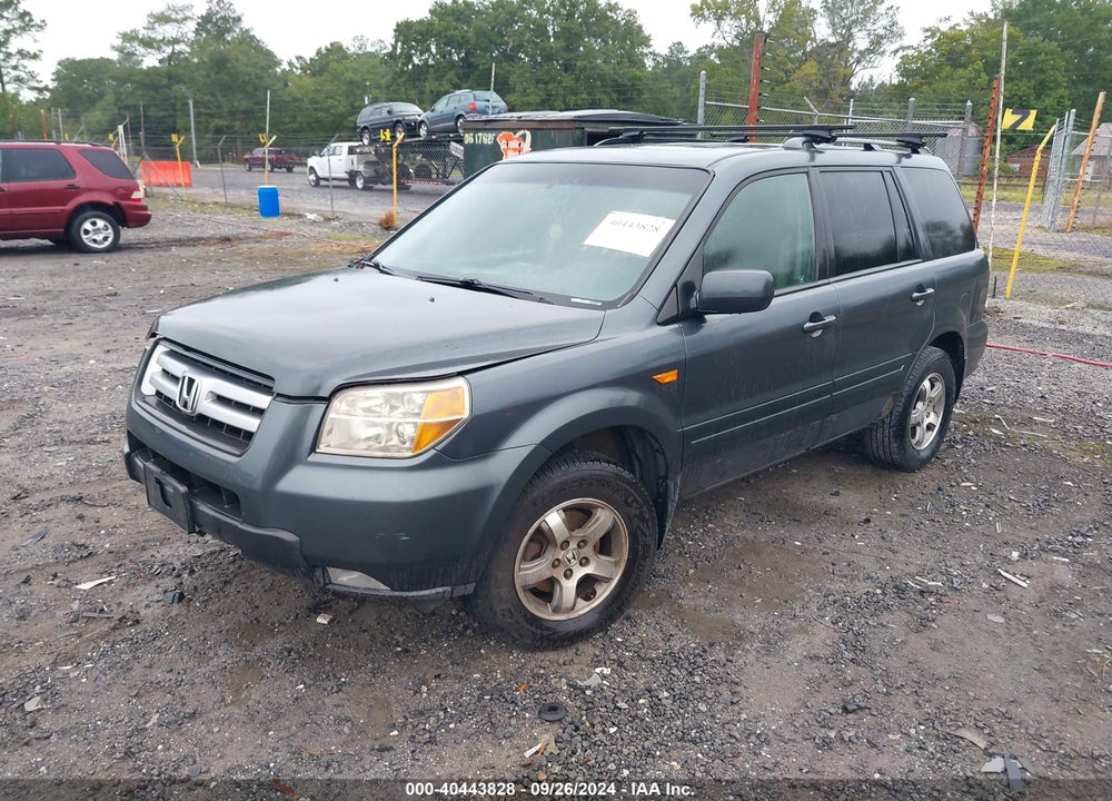 2006 HONDA PILOT EX-L VIN: 5FNYF28696B048001