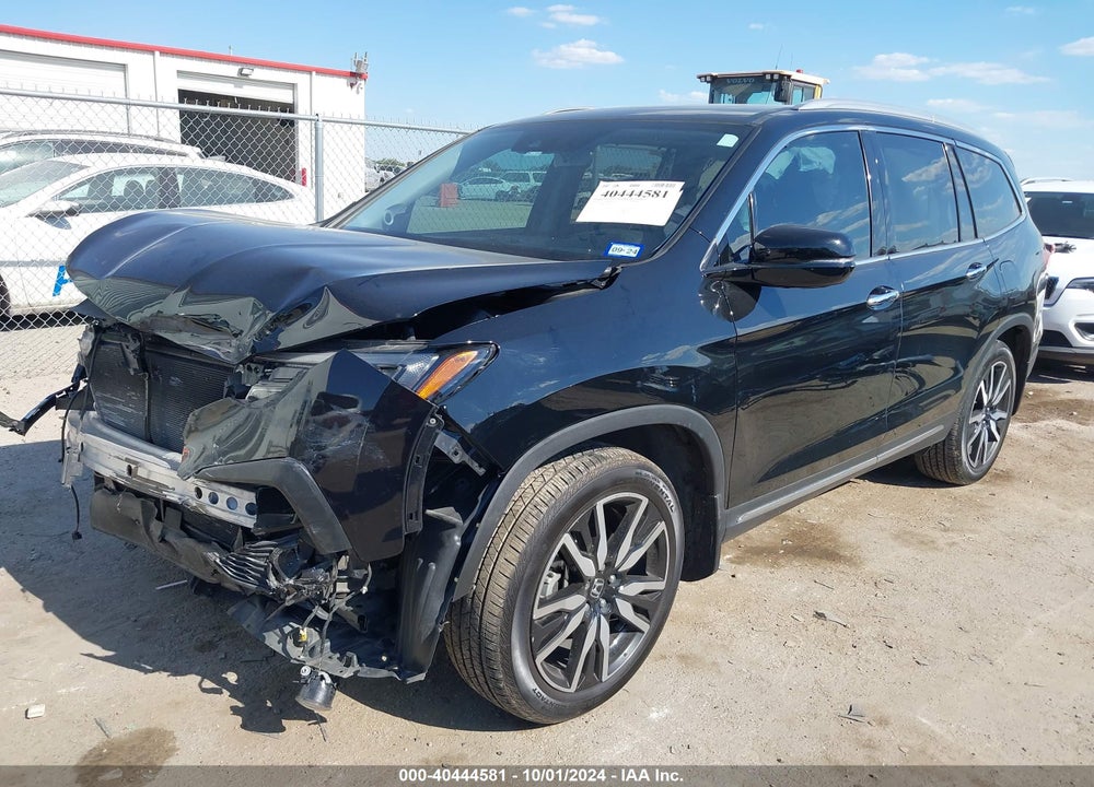 2021 HONDA PILOT 2WD TOURING 7 PASSENGER VIN: 5FNYF5H61MB000121
