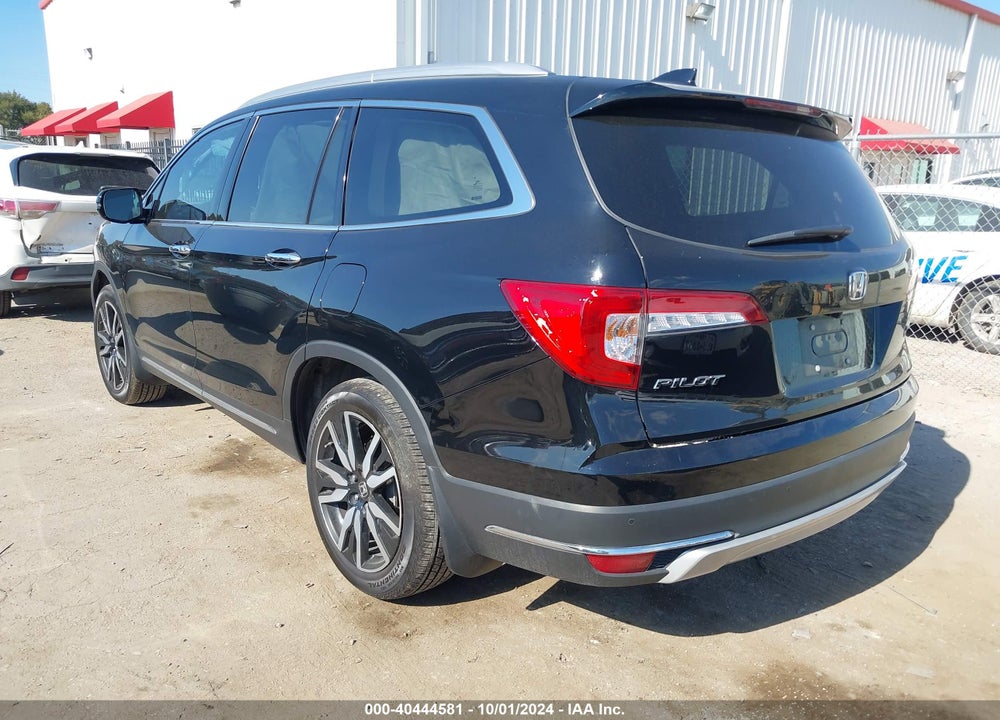 2021 HONDA PILOT 2WD TOURING 7 PASSENGER VIN: 5FNYF5H61MB000121