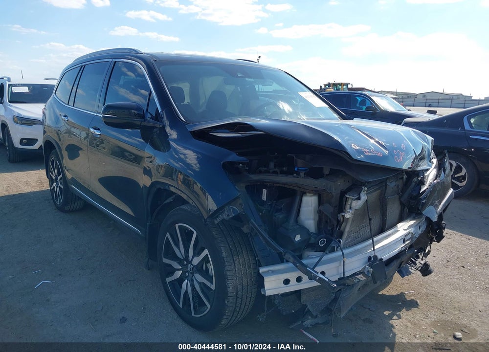2021 HONDA PILOT 2WD TOURING 7 PASSENGER VIN: 5FNYF5H61MB000121
