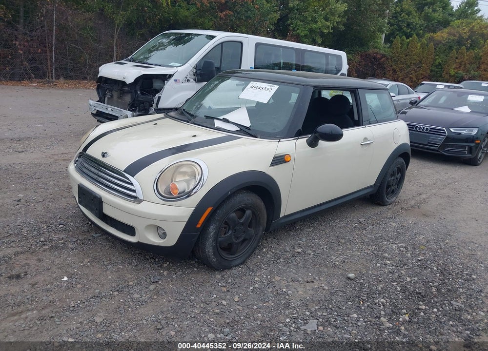 2009 MINI COOPER VIN: WMWMF33579TU75940