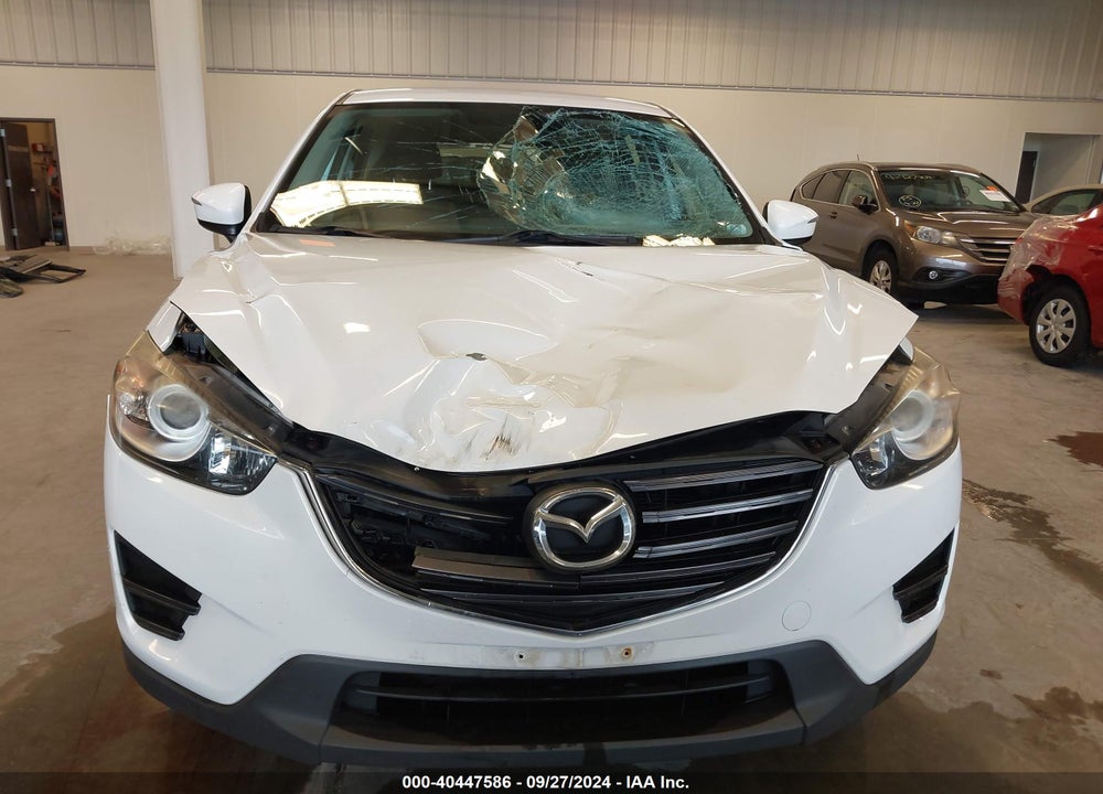 2016 MAZDA CX-5 SPORT VIN: JM3KE2BY4G0670970