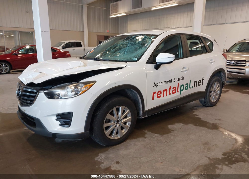 2016 MAZDA CX-5 SPORT VIN: JM3KE2BY4G0670970