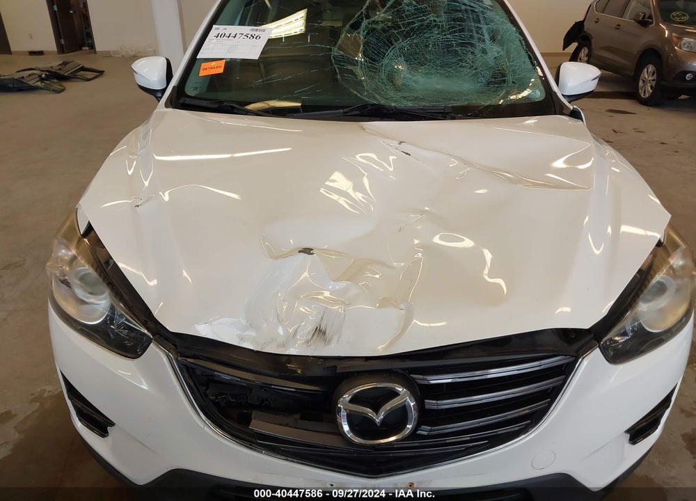 2016 MAZDA CX-5 SPORT VIN: JM3KE2BY4G0670970