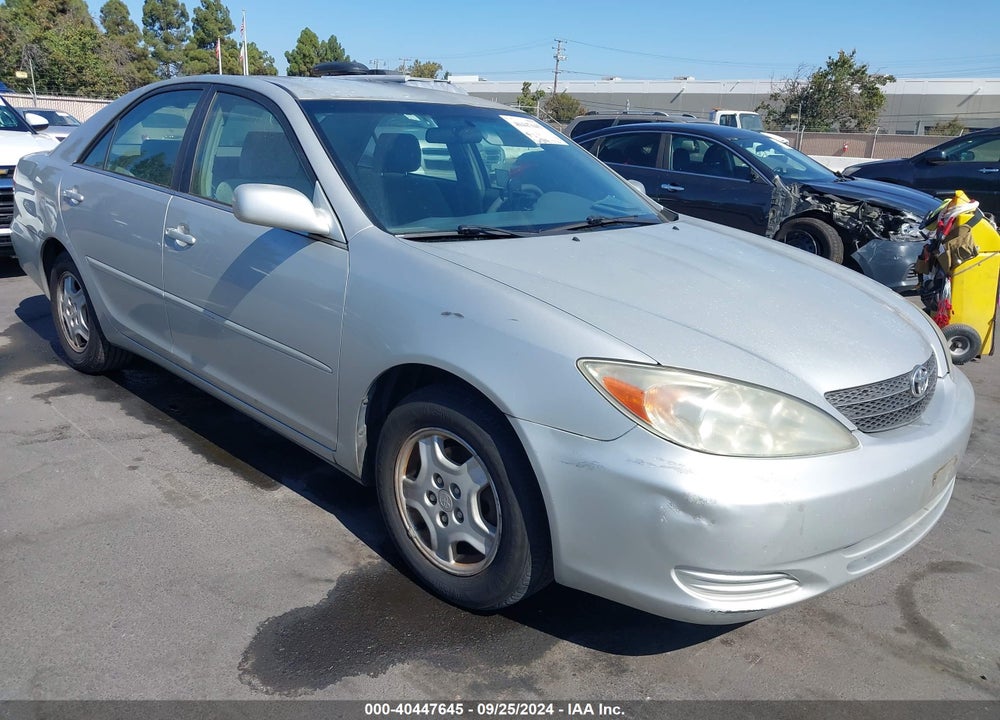 2003 TOYOTA CAMRY LE VIN: 4T1BF30K03U555940