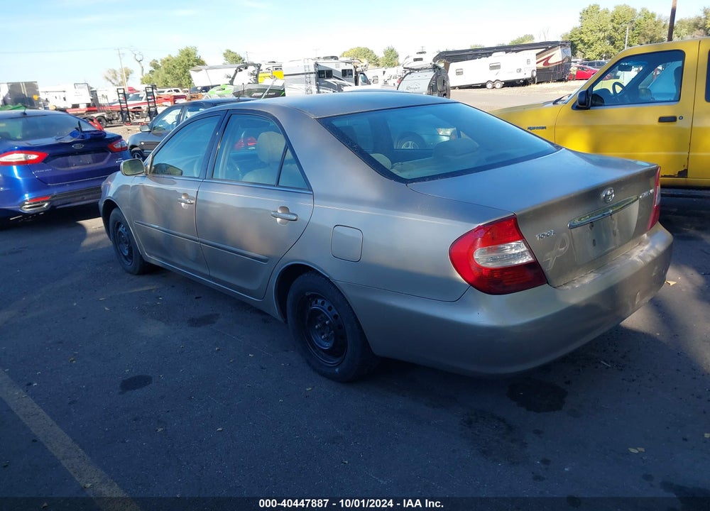 2002 TOYOTA CAMRY LE VIN: JTDBE32K520035873