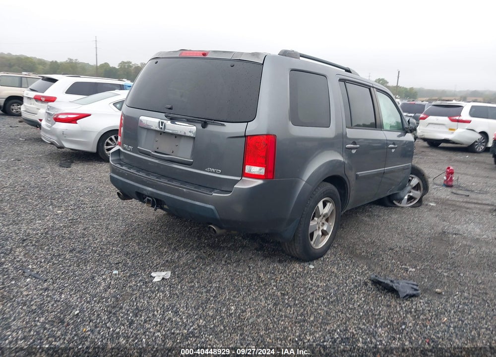 2011 HONDA PILOT EX-L VIN: 5FNYF4H64BB004008
