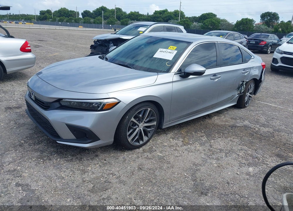 2023 HONDA CIVIC TOURING VIN: 2HGFE1F95PH320350