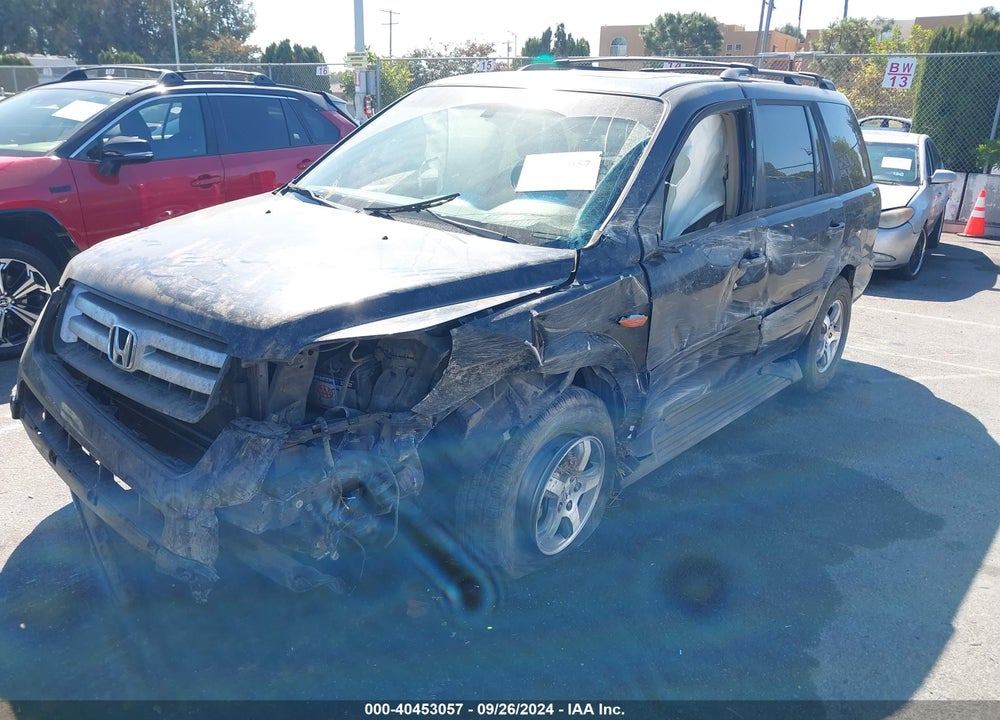 2006 HONDA PILOT EX-L VIN: 2HKYF18526H555311
