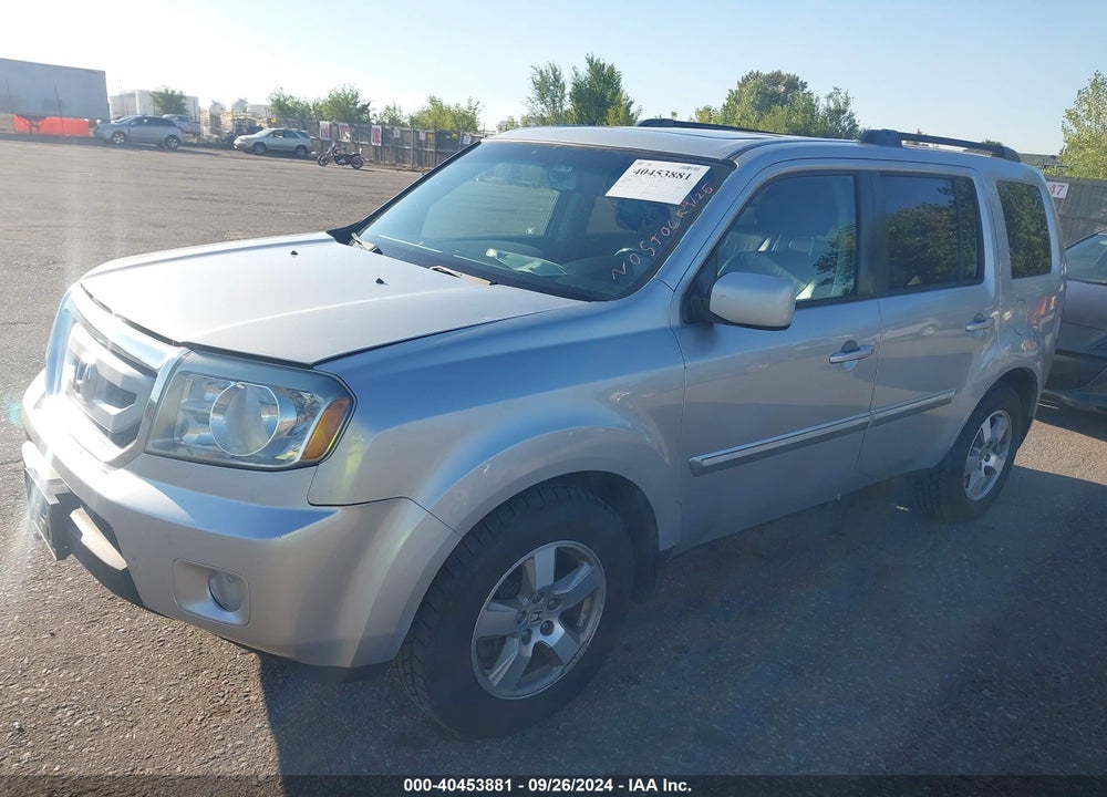 2011 HONDA PILOT EX-L VIN: 5FNYF4H54BB059324