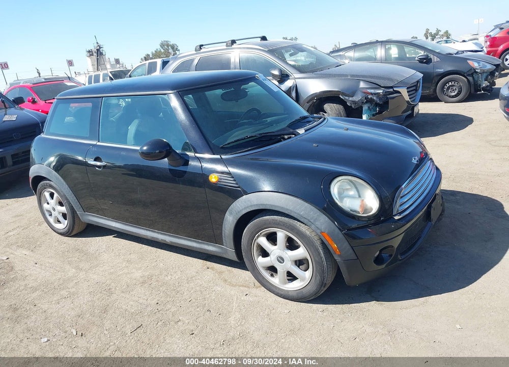 2010 MINI COOPER VIN: WMWMF3C55ATZ22737