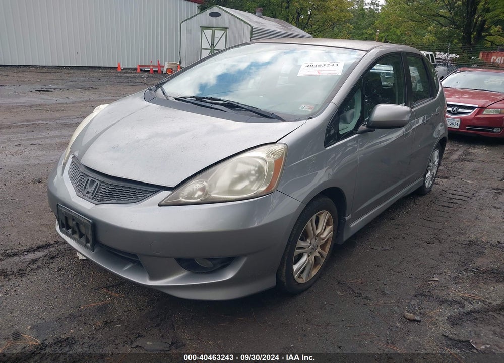 2009 HONDA FIT VIN: JHMGE874X9S069978