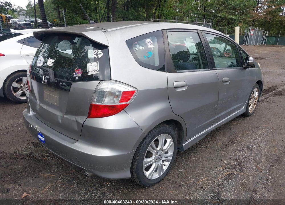 2009 HONDA FIT VIN: JHMGE874X9S069978