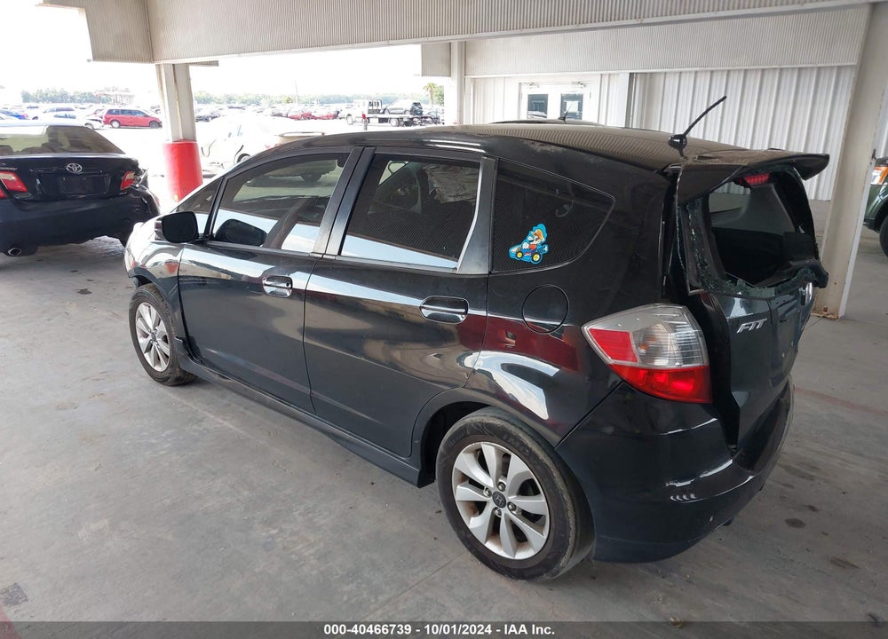 2011 HONDA FIT SPORT VIN: JHMGE8G57BC007821