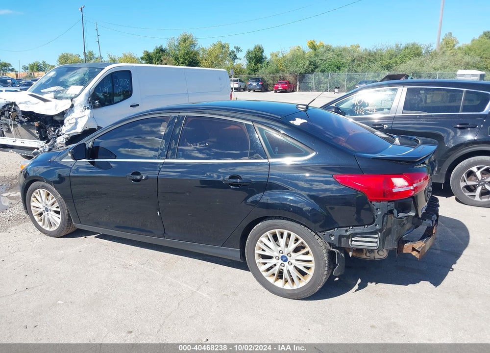 2016 FORD FOCUS TITANIUM VIN: 1FADP3J20GL243689