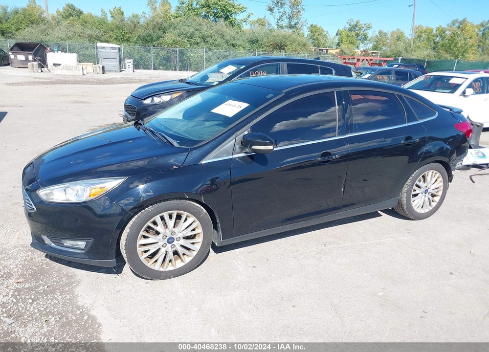 2016 FORD FOCUS TITANIUM VIN: 1FADP3J20GL243689