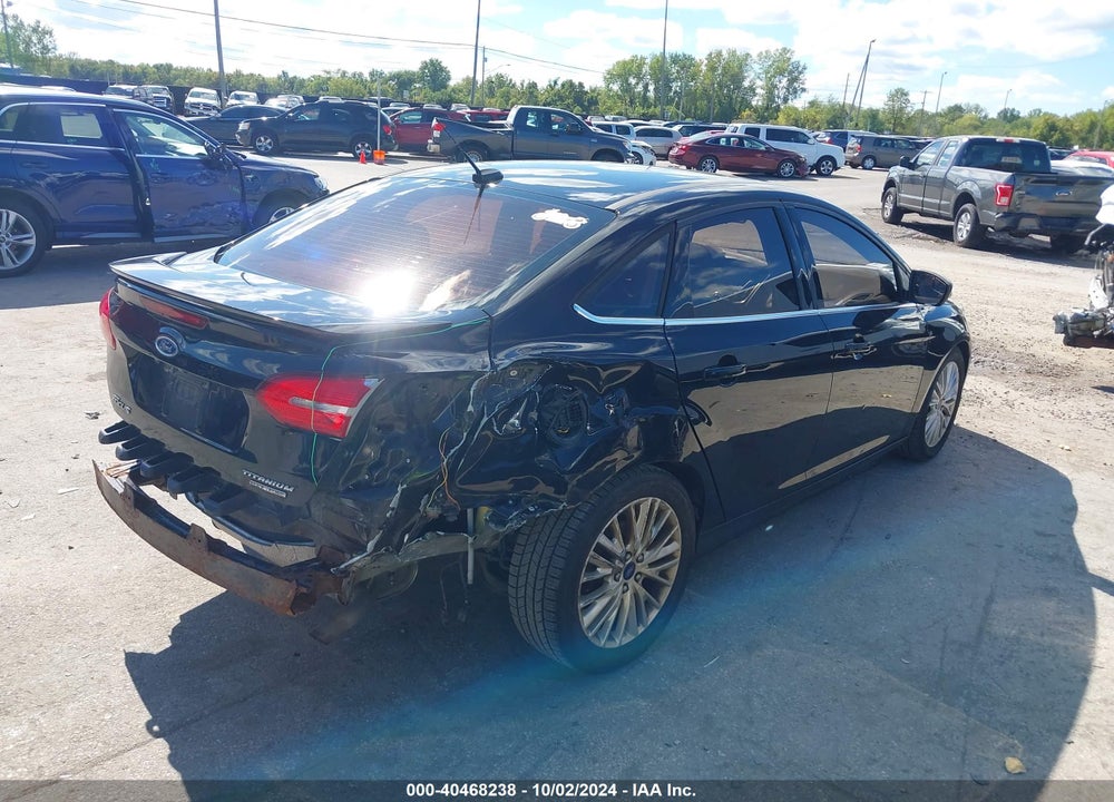 2016 FORD FOCUS TITANIUM VIN: 1FADP3J20GL243689