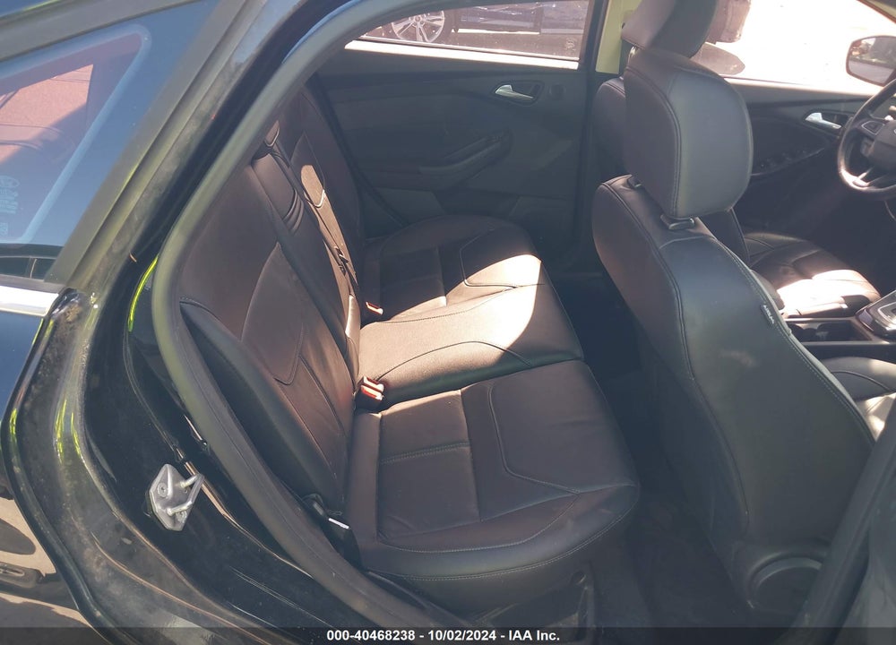 2016 FORD FOCUS TITANIUM VIN: 1FADP3J20GL243689
