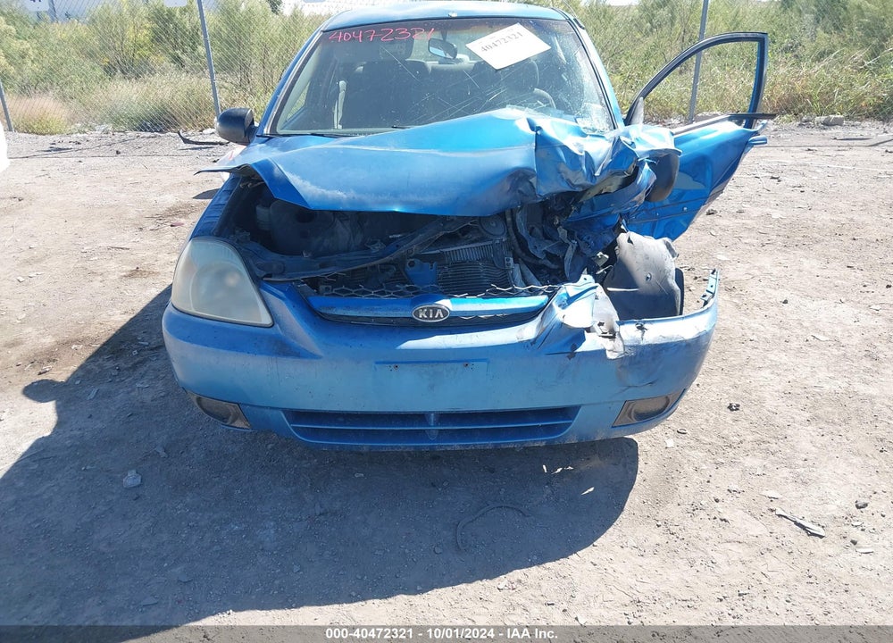 2003 KIA RIO VIN: KNADC125536273411