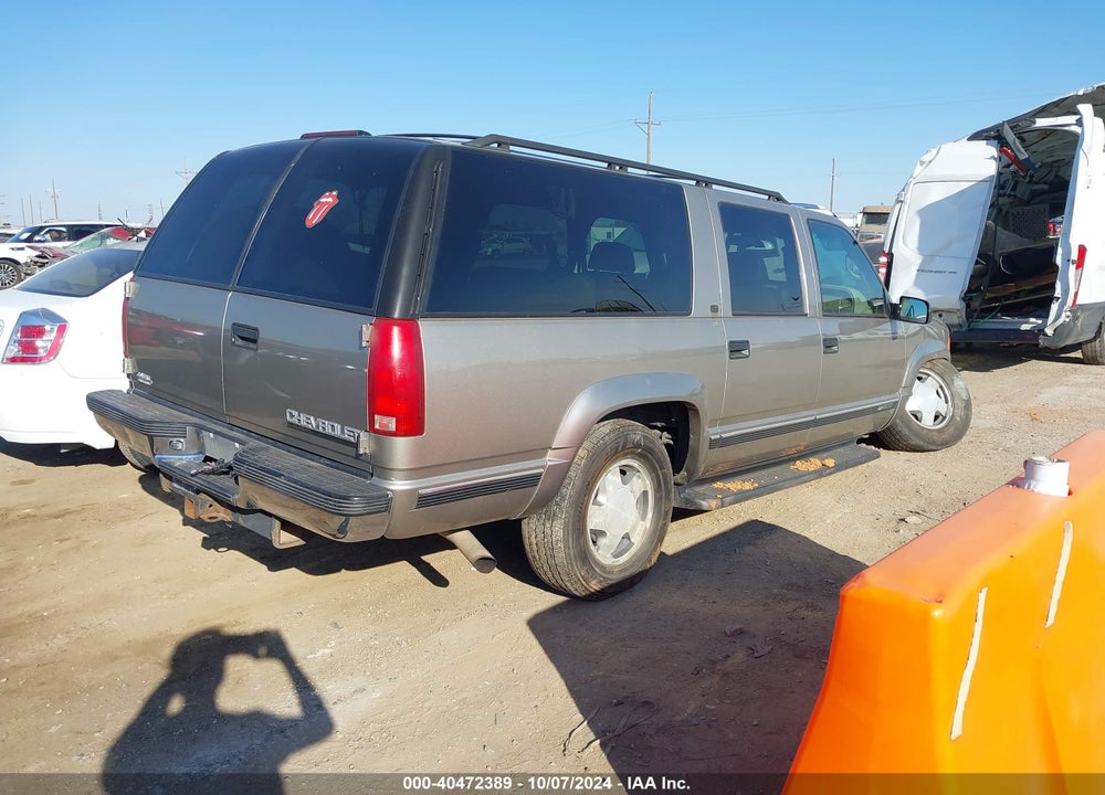 1999 CHEVROLET SUBURBAN 1500 LT VIN: 1GNFK16R4XJ569946