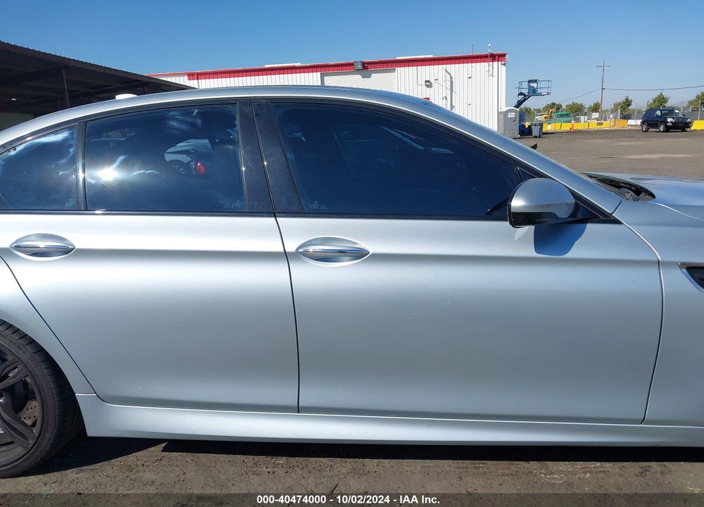 2014 BMW M5 VIN: WBSFV9C54ED593975