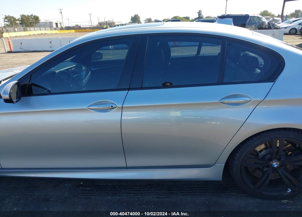 2014 BMW M5 VIN: WBSFV9C54ED593975