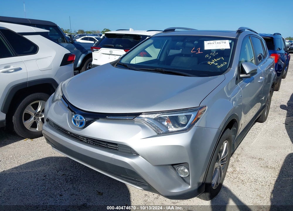 2016 TOYOTA RAV4 HYBRID XLE VIN: JTMRJREV7GD022304