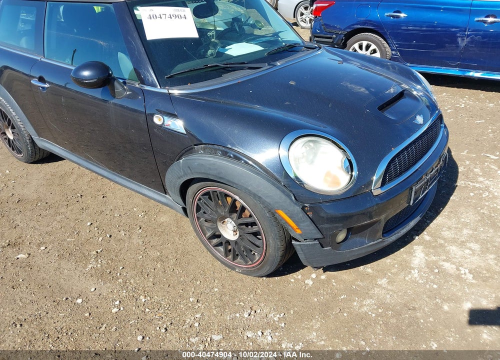 2007 MINI COOPER S VIN: WMWMF73567TL92407