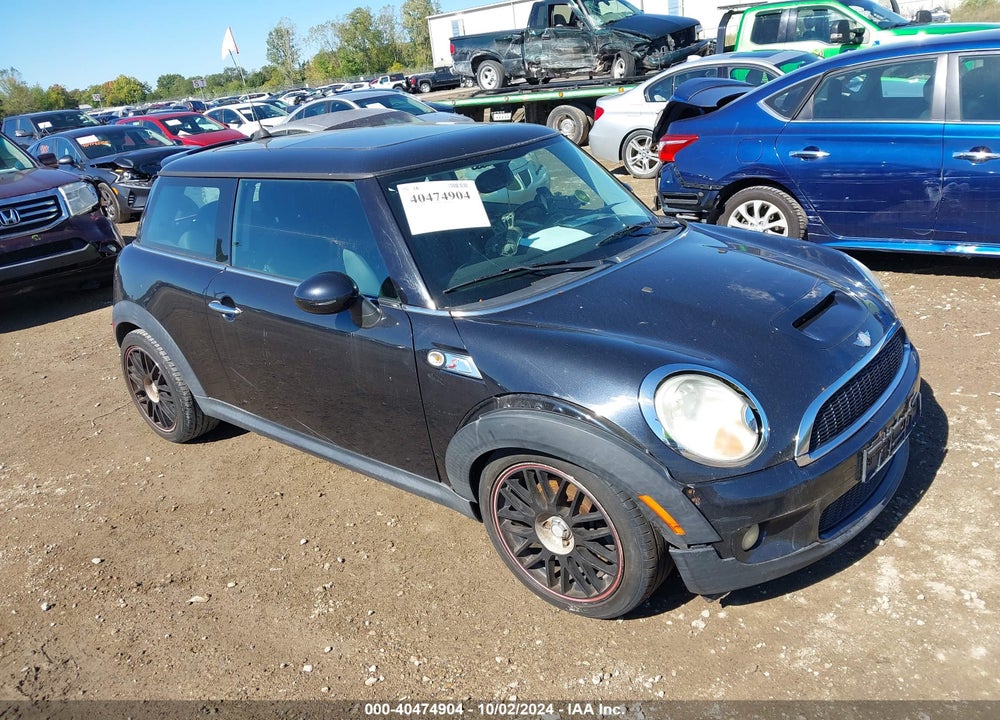 2007 MINI COOPER S VIN: WMWMF73567TL92407