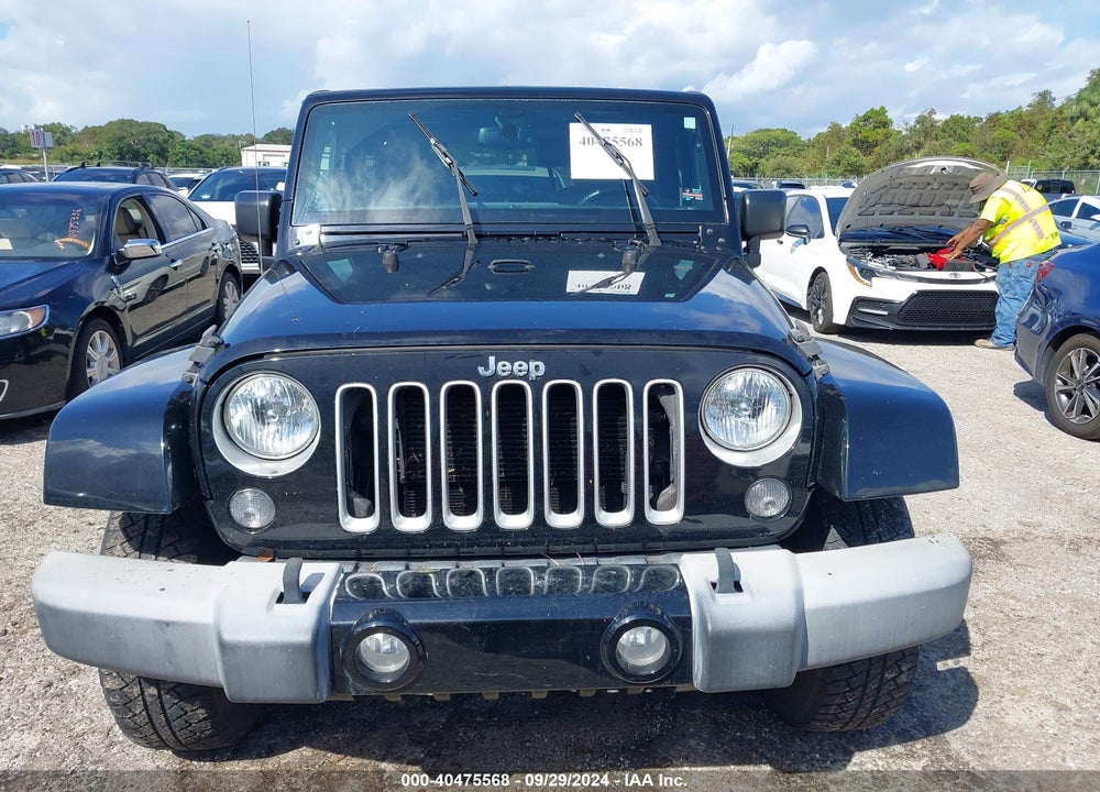 2016 JEEP WRANGLER SAHARA VIN: 1C4AJWBG8GL183140
