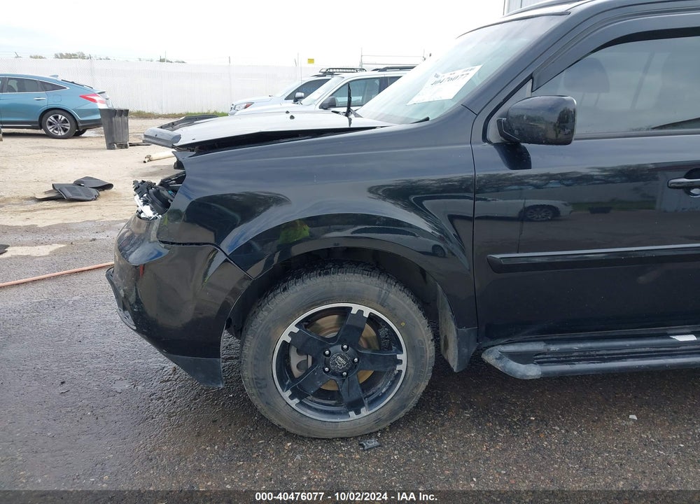 2012 HONDA PILOT EX-L VIN: 5FNYF4H65CB086011