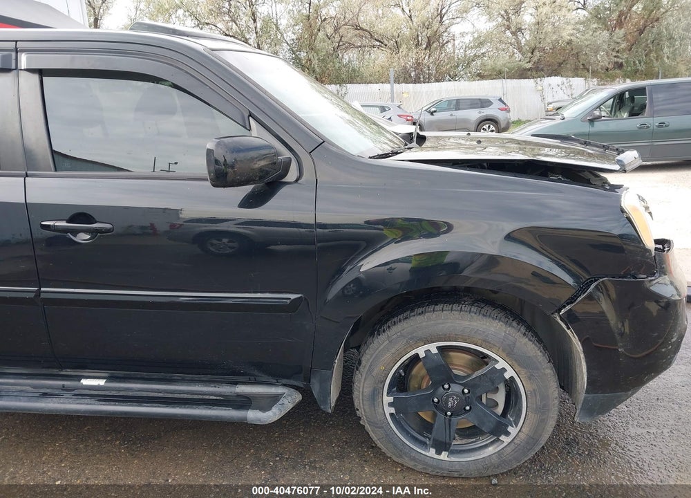 2012 HONDA PILOT EX-L VIN: 5FNYF4H65CB086011
