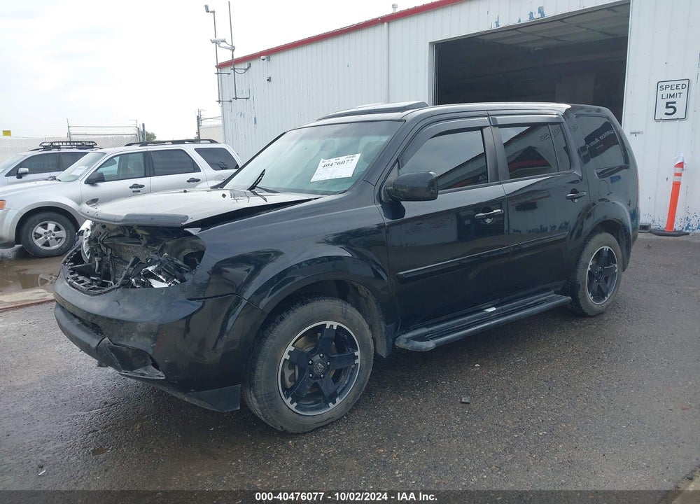 2012 HONDA PILOT EX-L VIN: 5FNYF4H65CB086011
