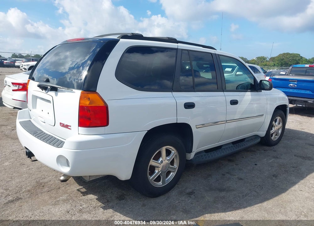 2009 GMC ENVOY SLE VIN: 1GKDT33S092129238