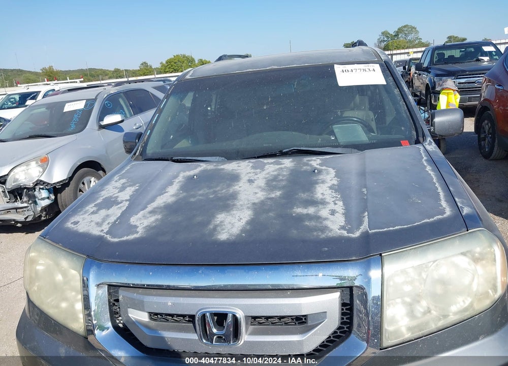 2009 HONDA PILOT EX-L VIN: 5FNYF48509B041395
