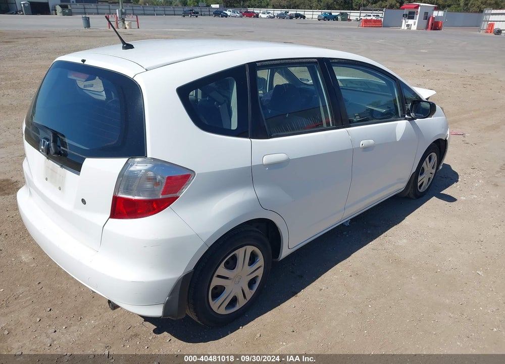 2009 HONDA FIT VIN: JHMGE88279S052407