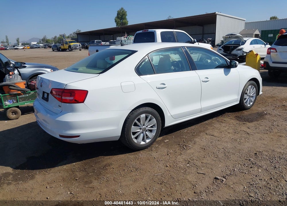 2015 VOLKSWAGEN JETTA 1.8T SE VIN: 3VWD17AJ4FM297176
