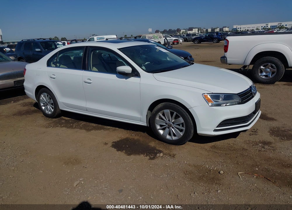 2015 VOLKSWAGEN JETTA 1.8T SE VIN: 3VWD17AJ4FM297176