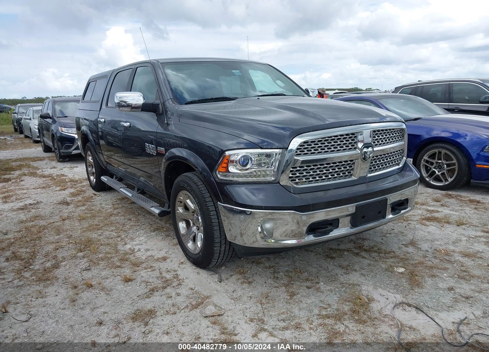 2018 RAM 1500 LAIE  4X4 5'7 BOX VIN: 1C6RR7NT2JS110036