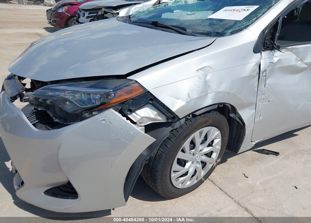 2018 TOYOTA COROLLA LE VIN: 5YFBURHE9JP834003