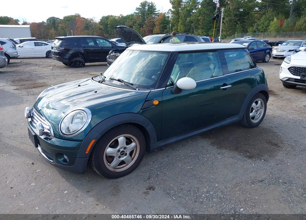 2009 MINI COOPER VIN: WMWMF33589TW74706