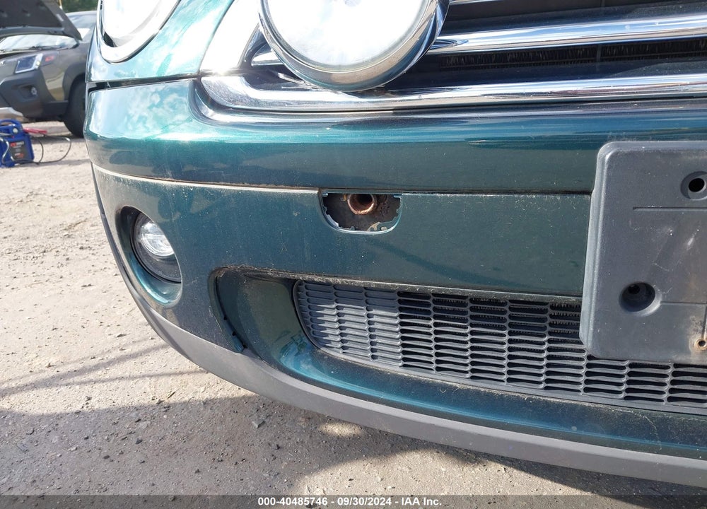 2009 MINI COOPER VIN: WMWMF33589TW74706