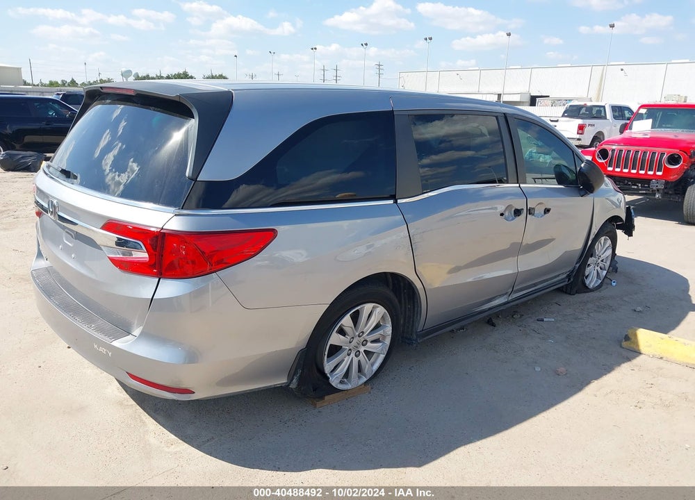 2018 HONDA ODYSSEY LX VIN: 5FNRL6H21JB106936