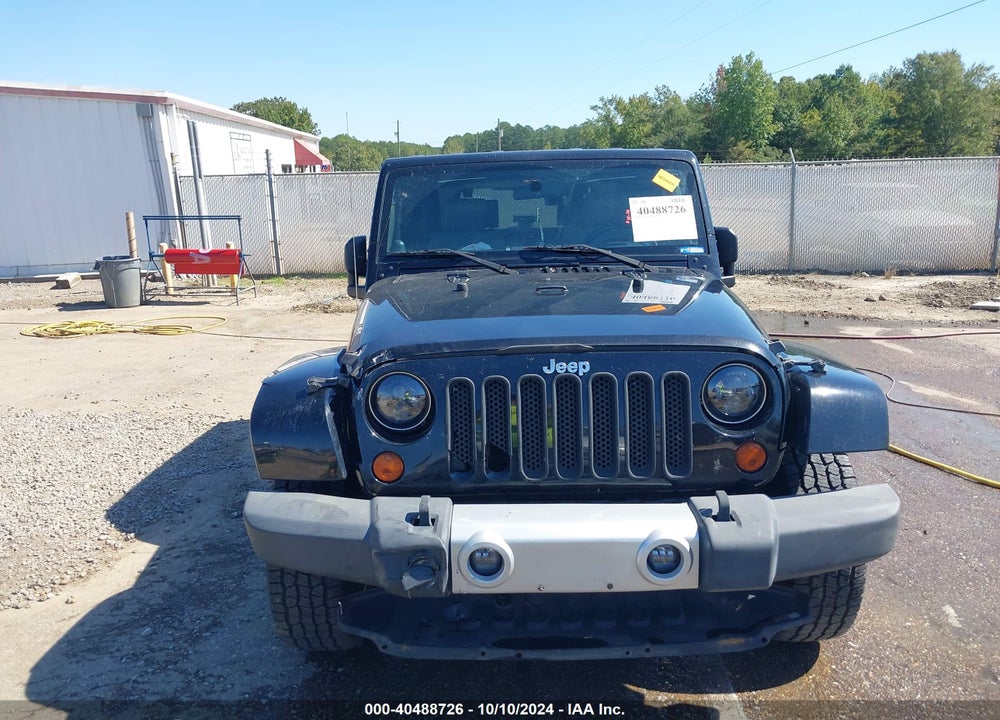 2010 JEEP WRANGLER SAHARA VIN: 1J4GA5D1XAL216217