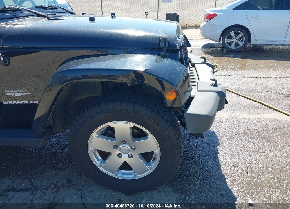 2010 JEEP WRANGLER SAHARA VIN: 1J4GA5D1XAL216217