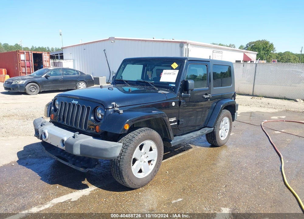 2010 JEEP WRANGLER SAHARA VIN: 1J4GA5D1XAL216217