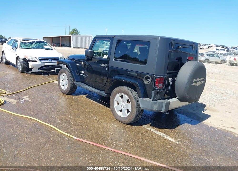 2010 JEEP WRANGLER SAHARA VIN: 1J4GA5D1XAL216217